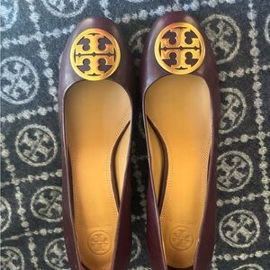 Tory Burch Maroon Flats with Gold Emblem
